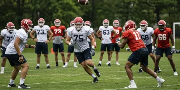 College football players in action during Spring Practice 2025, focusing on drills and team preparation.