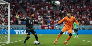 US Goalkeeper Defensive Strategies: 2026 Standouts Analyzed Two US goalkeepers showcasing contrasting defensive styles on a soccer field, ready for 2026.